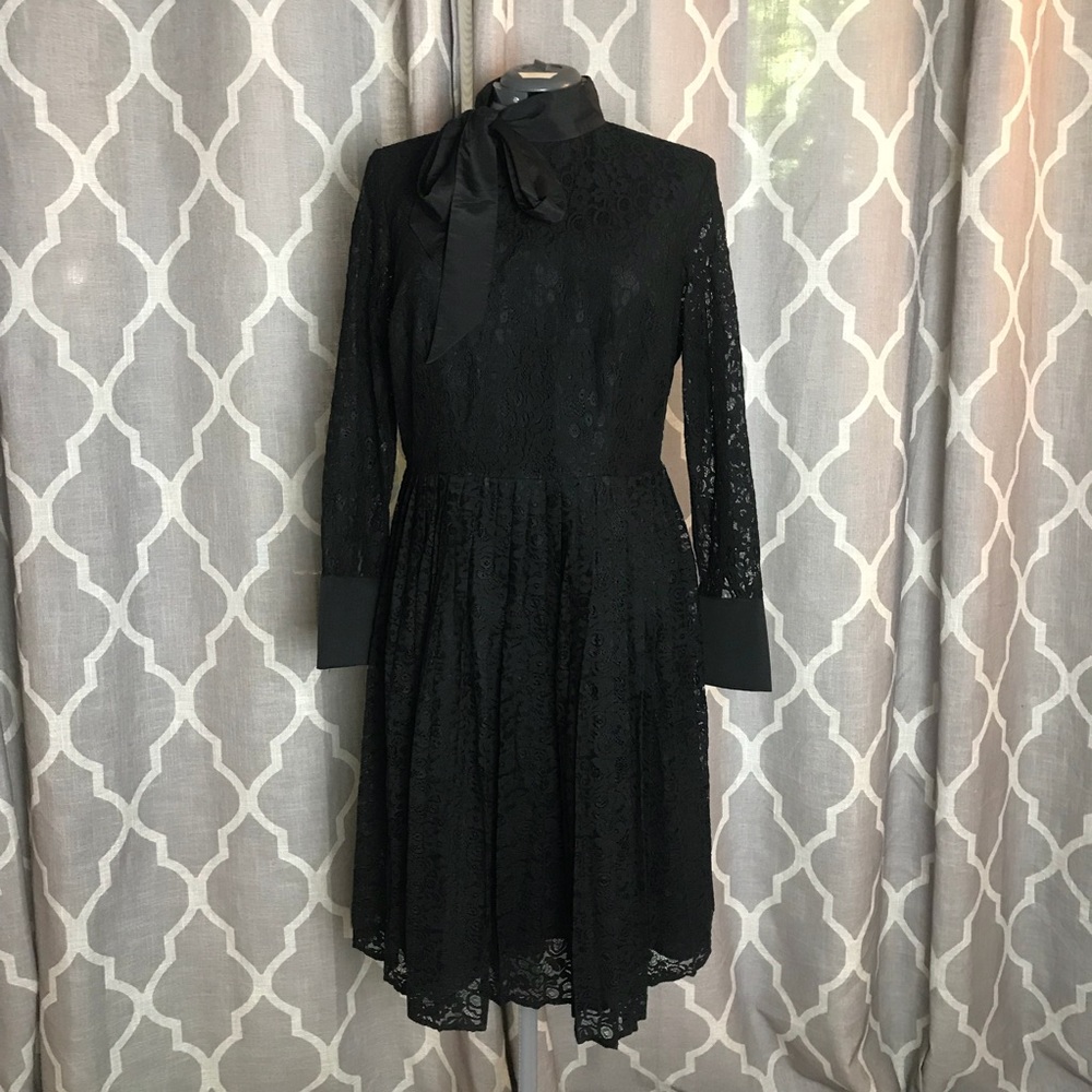 Neck tie lace dress.